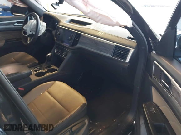 2021 Volkswagen Atlas SE with VIN 1V2LC2CA3MC214441, listed as a IAAI auction lot 40997824 with 87,846 mi miles and . Bid and sale history available at DreamBid. Image 5.