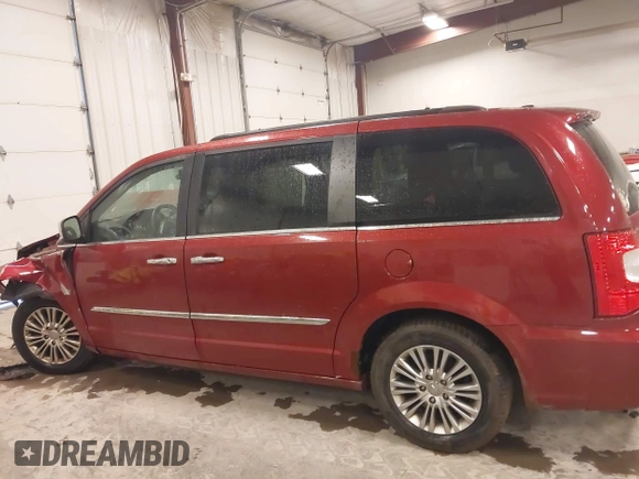 2015 Chrysler Town & Country Touring L with VIN 2C4RC1CG8FR525304, listed as a IAAI auction lot 41829438 with 125,587 mi miles and . Bid and sale history available at DreamBid. Image 14.