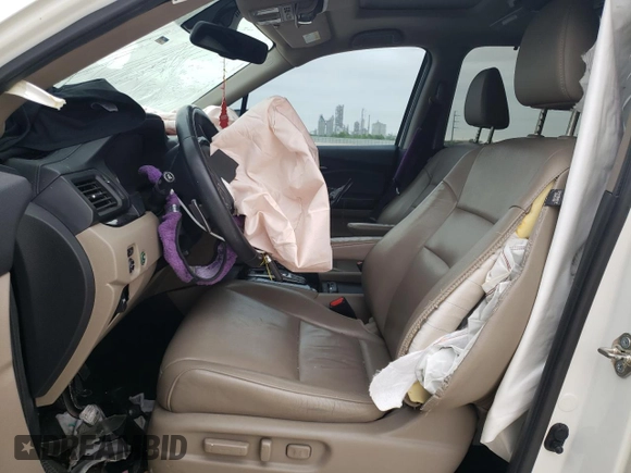 2017 Honda Pilot Touring with VIN 5FNYF5H95HB015365, listed as a Copart auction lot 52371205 with 153,141 mi miles and Salvage title. Bid and sale history available at DreamBid. Image 7.