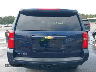 2018 Chevrolet Tahoe LT with VIN 1GNSKBKC7JR256937, listed as a IAAI auction lot 42614438 with 92,794 mi miles and . Bid and sale history available at DreamBid. Image 16.
