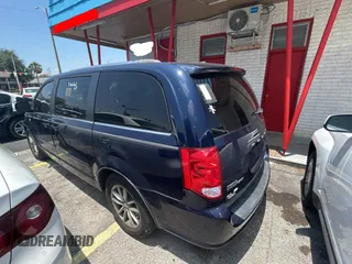 2014 Dodge Grand Caravan SXT with VIN 2C4RDGCG1ER308403, listed as a Copart auction lot 56712885 with 131,847 mi miles and Clean Title. Bid and sale history available at DreamBid. Image 3.