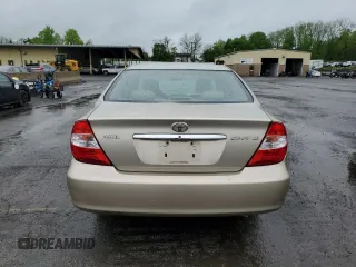 2002 Toyota Camry LE z VIN 4T1BE32K42U623283, wystawiony jako Copart lot #55631065 z przebiegiem 96 830 mil mil oraz Szkoda całkowita • Salvage title. Historia ofert i sprzedaży dostępna na DreamBid. Obrazek 6.