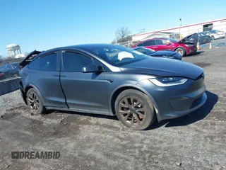 2022 Tesla Model X with VIN 7SAXCDE52NF345835, listed as a IAAI auction lot 41823522 with 24,401 mi miles and . Bid and sale history available at DreamBid. Image 12.