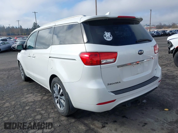 2016 Kia Sedona EX with VIN KNDMC5C14G6170086, listed as a IAAI auction lot 41736246 with 82,556 mi miles. Bid and sale history available at carsss.com. Image 3.