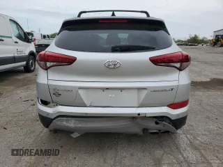2017 Hyundai Tucson Value z VIN KM8J33A26HU336538, wystawiony jako Copart lot #57103535 z przebiegiem 97 575 mil mil oraz Czysty tytuł • Clean title. Historia ofert i sprzedaży dostępna na DreamBid. Obrazek 6.