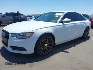 2014 Audi A6 Premium Plus with VIN WAUGFAFC6EN054589, listed as a IAAI auction lot 42308820 with 134,566 mi miles and . Bid and sale history available at DreamBid. Image 2.