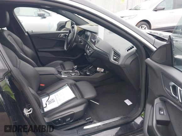 2021 BMW 2 Series 228i xDrive with VIN WBA73AK06M7H58799, listed as a IAAI auction lot 42172057 with 71,412 mi miles and . Bid and sale history available at DreamBid. Image 5.