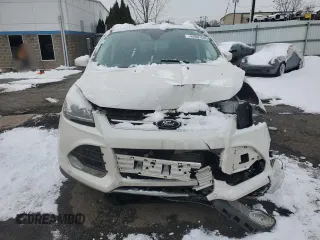 2016 Ford Escape Titanium with VIN 1FMCU9J90GUC70945, listed as a Copart auction lot 44897595 with 119,875 mi miles and Salvage Title. Bid and sale history available at DreamBid. Image 5.