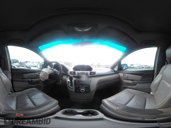 2012 Honda Odyssey EX-L with VIN 5FNRL5H66CB061847, listed as a IAAI auction lot 42162377 with 217,204 mi miles and . Bid and sale history available at DreamBid. Image 18.