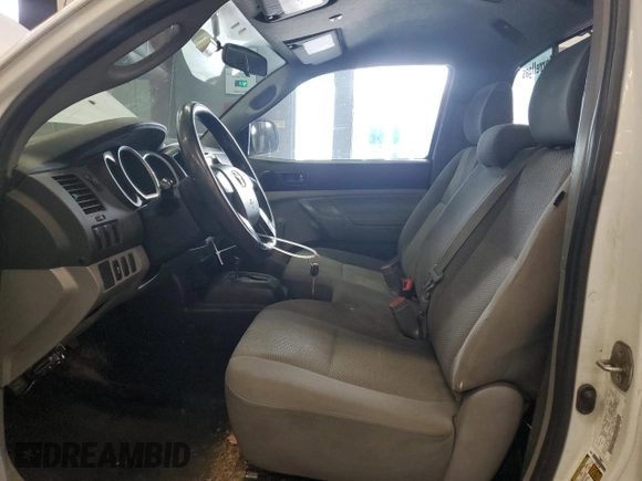 2013 Toyota Tacoma z VIN 5TFNX4CNXDX030314, wystawiony jako Copart lot #60300185 z przebiegiem 217 513 mil mil oraz Czysty tytuł • Clean title. Historia ofert i sprzedaży dostępna na DreamBid. Obrazek 7.