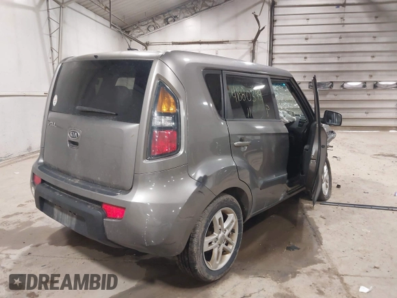 2011 Kia Soul + with VIN KNDJT2A23B7317367, listed as a IAAI auction lot 41880399 with 186,736 mi miles. Bid and sale history available at carsss.com. Image 4.