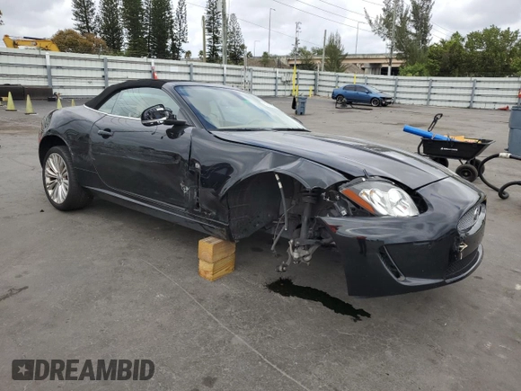 2011 Jaguar XK with VIN SAJWA4GB0BLB38875, listed as a Copart auction lot 52045805 with 35,487 mi miles and Salvage Title. Bid and sale history available at carsss.com. Image 4.