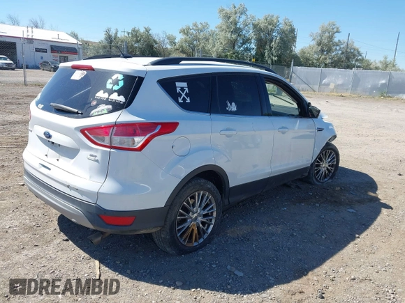 2016 Ford Escape SE with VIN 1FMCU9GX9GUC62462, listed as a IAAI auction lot 39999808 with Not Provided miles. Bid and sale history available at carsss.com. Image 4.
