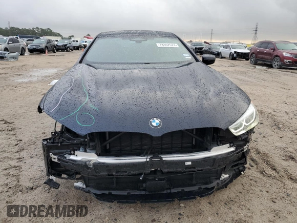 2022 BMW 8 Series M850i z VIN WBAGV8C02NCH18326, wystawiony jako Copart lot #78362624 z przebiegiem 21 393 mil mil oraz Szkody całkowita. Historia ofert i sprzedaży dostępna na DreamBid. Obrazek 5.