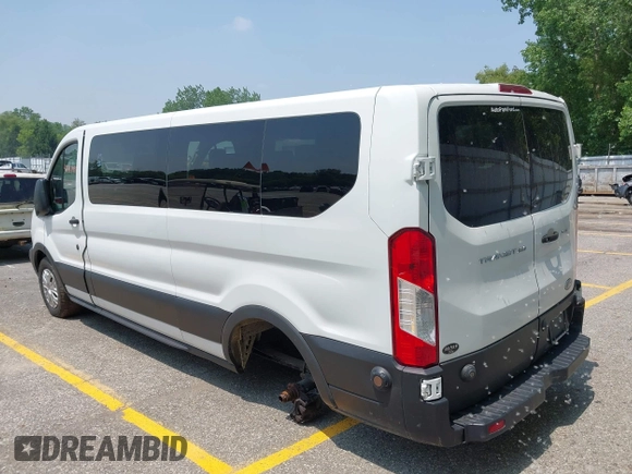 2019 Ford Transit Passenger XL z VIN 1FBZX2YM4KKB64966, wystawiony jako IAAI lot #42417498 z przebiegiem 157 311 mil mil oraz . Historia ofert i sprzedaży dostępna na DreamBid. Obrazek 3.