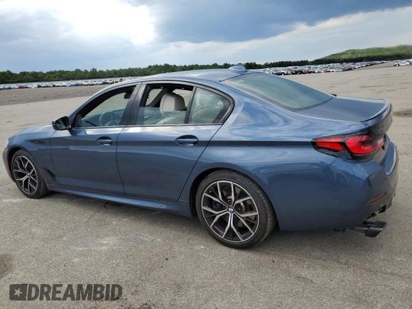 2023 BMW 5 Series M550i xDrive with VIN WBA13BK06PCM31937, listed as a Copart auction lot 66490494 with 24,972 mi miles and Salvage title. Bid and sale history available at DreamBid. Image 2.