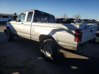 1991 Ford Ranger with VIN 1FTCR15T2MPA03393, listed as a Copart auction lot 89352295 with 28,308 mi miles and Salvage Title. Bid and sale history available at DreamBid. Image 2.