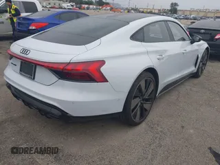 2023 Audi e-tron GT Prestige z VIN WAUEJBFW3P7004116, wystawiony jako IAAI lot #41771964 z przebiegiem 23 984 mil mil oraz . Historia ofert i sprzedaży dostępna na DreamBid. Obrazek 4.