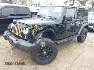 2014 Jeep Wrangler Unlimited Sahara with VIN 1C4HJWEG1EL202974, listed as a IAAI auction lot 41591870 with 17,174 mi miles. Bid and sale history available at carsss.com. Image 2.