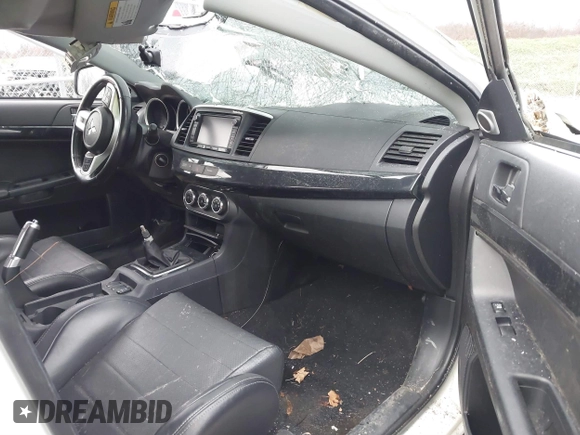 2014 Mitsubishi Lancer Evolution GSR with VIN JA32W8FV5EU012572, listed as a IAAI auction lot 40871463 with 89,529 mi miles. Bid and sale history available at carsss.com. Image 5.