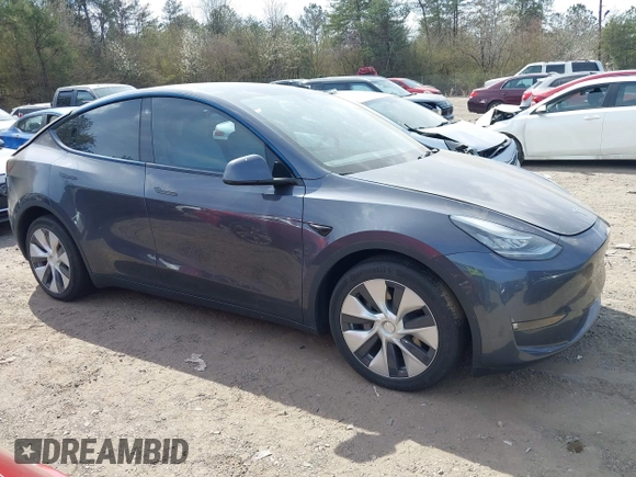 2022 Tesla Model Y Long Range z VIN 7SAYGDEE2NF447998, wystawiony jako IAAI lot #41704968 z przebiegiem 34 088 mil mil oraz . Historia ofert i sprzedaży dostępna na DreamBid. Obrazek 13.