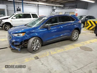 2021 Ford Edge Titanium with VIN 2FMPK4K98MBA18841, listed as a Copart auction lot 56207745 with 69,249 mi miles and Salvage title. Bid and sale history available at DreamBid. Image 1.
