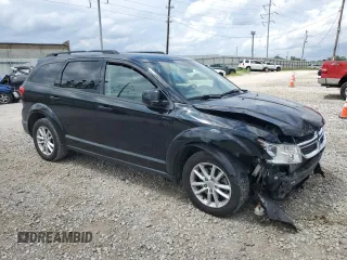 2017 Dodge Journey SXT with VIN 3C4PDCBG5HT576180, listed as a Copart auction lot 65262685 with 103,565 mi miles and Salvage title. Bid and sale history available at DreamBid. Image 4.
