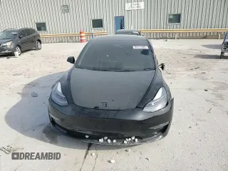 2022 Tesla Model 3 Long Range z VIN 5YJ3E1EBXNF229342, wystawiony jako Copart lot #50171085 z przebiegiem 66 009 mil mil oraz Szkoda całkowita • Salvage title. Historia ofert i sprzedaży dostępna na DreamBid. Obrazek 11.