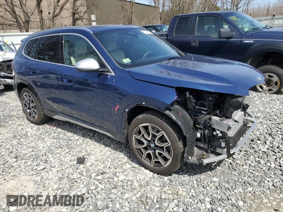 2023 BMW X1 xDrive28i with VIN WBX73EF05P5Y21721, listed as a Copart auction lot 50749295 with 10,633 mi miles and Salvage title. Bid and sale history available at DreamBid. Image 4.