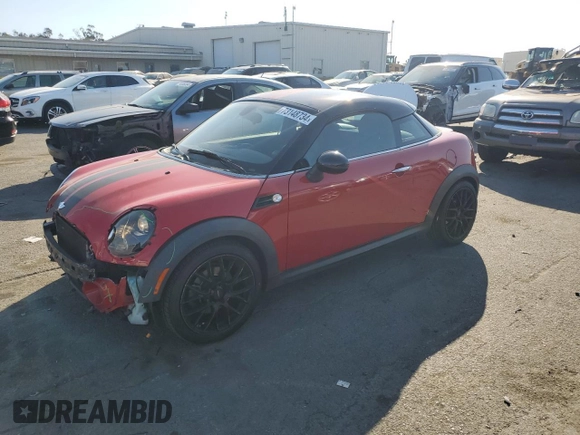 2012 MINI Cooper Coupe with VIN WMWSX1C5XCT163790, listed as a Copart auction lot 73148734 with 144,323 mi miles and Salvage Title. Bid and sale history available at carsss.com. Image 1.
