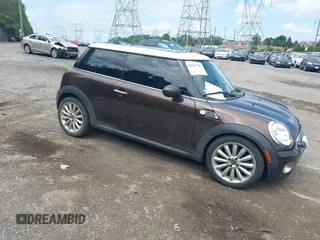 2010 MINI Hardtop with VIN WMWMF3C55ATZ23127, listed as a IAAI auction lot 42667783 with 61,954 mi miles and . Bid and sale history available at DreamBid. Image 1.