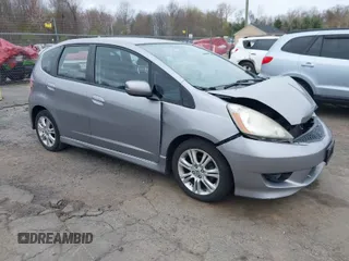 2009 Honda Fit Sport with VIN JHMGE88429S059170, listed as a IAAI auction lot 42091260 with 135,822 mi miles. Bid and sale history available at carsss.com. Image 1.