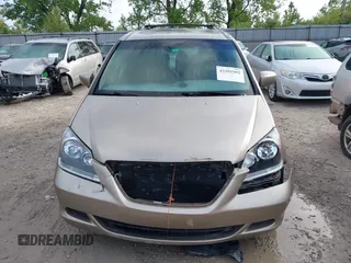 2006 Honda Odyssey EX-L z VIN 5FNRL38756B458936, wystawiony jako IAAI lot #42201902 z przebiegiem 339 976 mil mil oraz . Historia ofert i sprzedaży dostępna na DreamBid. Obrazek 12.