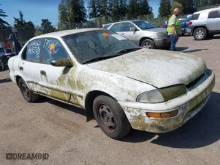 1994 Geo Prizm with VIN 1Y1SK5363RZ020392, listed as a IAAI auction lot 42023319 with 260,533 mi miles. Bid and sale history available at carsss.com. Image 1.