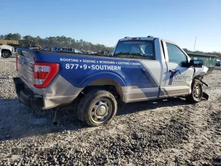 2023 Ford F-150 XL with VIN 1FTMF1CB2PKG05574, listed as a Copart auction lot 49050295 with 33,563 mi miles and Salvage Title. Bid and sale history available at carsss.com. Image 3.
