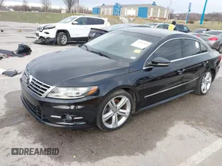 2014 Volkswagen CC R-Line with VIN WVWBN7ANXEE521055, listed as a IAAI auction lot 41197539 with 94,902 mi miles. Bid and sale history available at carsss.com. Image 19.