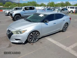 2016 Nissan Maxima SV with VIN 1N4AA6AP5GC395274, listed as a IAAI auction lot 41616698 with 102,736 mi miles and . Bid and sale history available at DreamBid. Image 2.