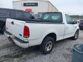 2003 Ford F-150 XL with VIN 1FTRF17253NB64662, listed as a IAAI auction lot 41681596 with 271,536 mi miles and . Bid and sale history available at DreamBid. Image 4.