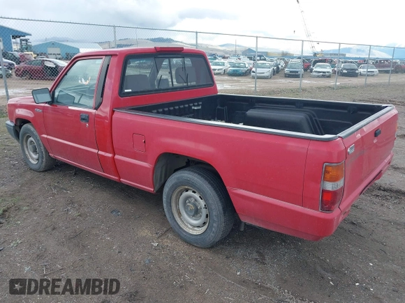 1994 Mitsubishi Mighty Max z VIN JA7LS21G0RP007773, wystawiony jako IAAI lot #41915117 z przebiegiem 68 410 mil mil oraz . Historia ofert i sprzedaży dostępna na DreamBid. Obrazek 3.