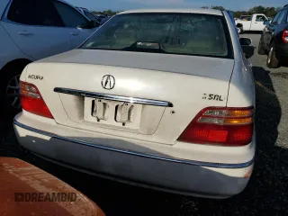 2000 Acura RL with VIN JH4KA9654YC000685, listed as a Copart auction lot 73986054 with 0 mi miles and Salvage Title. Bid and sale history available at carsss.com. Image 6.
