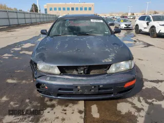 1997 Nissan Maxima GXE with VIN JN1CA21D0VT201140, listed as a Copart auction lot 52230495 with 286,440 mi miles and Clean title. Bid and sale history available at DreamBid. Image 5.