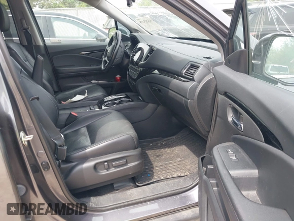 2020 Honda Pilot Elite with VIN 5FNYF6H00LB027472, listed as a IAAI auction lot 42253478 with 69,988 mi miles and . Bid and sale history available at DreamBid. Image 5.
