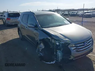 2016 Hyundai Santa Fe z VIN 5XYZUDLB6GG356361, wystawiony jako IAAI lot #41782099 z przebiegiem 99 554 mil mil oraz . Historia ofert i sprzedaży dostępna na DreamBid. Obrazek 1.