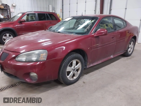 2005 Pontiac Grand Prix z VIN 2G2WP522651347494, wystawiony jako IAAI lot #41967441 z przebiegiem 303 769 mil mil oraz . Historia ofert i sprzedaży dostępna na DreamBid. Obrazek 2.