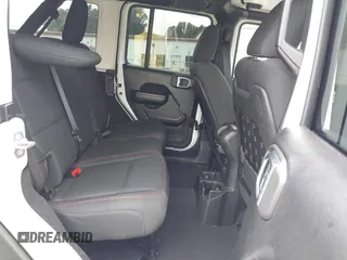 2021 Jeep Wrangler Unlimited Rubicon with VIN 1C4HJXFG7MW527498, listed as a IAAI auction lot 42393520 with 18,085 mi miles and . Bid and sale history available at DreamBid. Image 8.