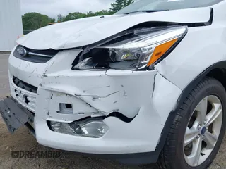 2014 Ford Escape SE with VIN 1FMCU9GX4EUE32062, listed as a IAAI auction lot 42710911 with 68,201 mi miles and . Bid and sale history available at DreamBid. Image 14.