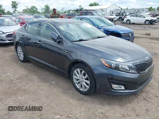 2015 Kia Optima EX z VIN 5XXGN4A75FG503534, wystawiony jako IAAI lot #42346082 z przebiegiem 83 293 mil mil oraz . Historia ofert i sprzedaży dostępna na DreamBid. Obrazek 1.