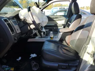 2009 Mercury Mariner Premier with VIN 4M2CU87789KJ18733, listed as a Copart auction lot 76346234 with 0 mi miles and Salvage Title. Bid and sale history available at carsss.com. Image 7.