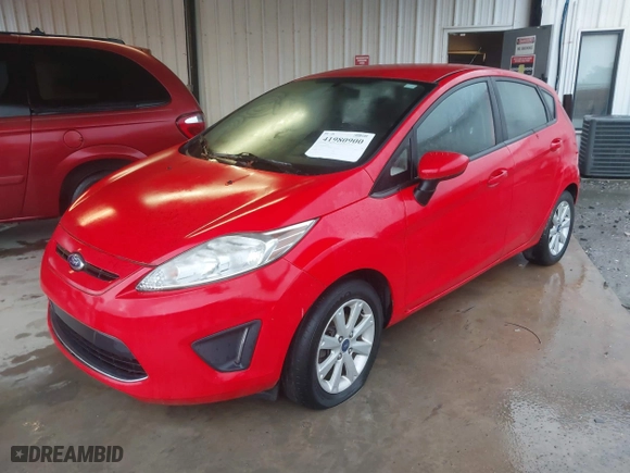 2012 Ford Fiesta SE with VIN 3FADP4EJ4CM215670, listed as a IAAI auction lot 41980900 with 87,874 mi miles. Bid and sale history available at carsss.com. Image 2.