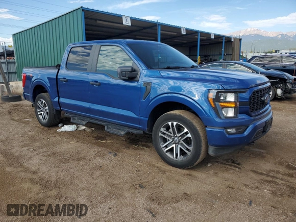 2023 Ford F-150 XL with VIN 1FTEW1EP8PKE04419, listed as a Copart auction lot 60843835 with 31,684 mi miles and Salvage title. Bid and sale history available at DreamBid. Image 4.